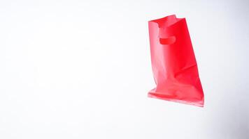 Open Red Pink Plastic Bag Mock Up on White Background photo