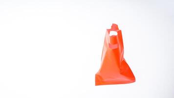 Empty Open Red Plastic Bag Mock Up with Handle on White Background photo