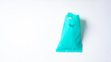 Open Turquoise Plastic Bag Mock Up on White Background photo
