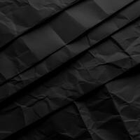 Abstract Black Crumpled Paper Texture Background Showing Diagonal Lines and Shadows photo