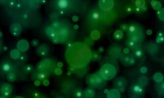 Glowing green bokeh circles. abstract shiny bokeh dark background. vector