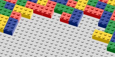 a colorful set of toy brick blocks on a gray background vector