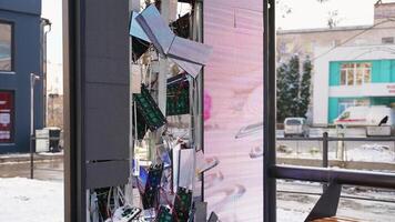 Vandalized digital billboard with broken LED screen and wiring video