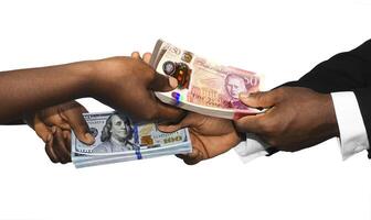 Two black african people hands holding exchanging stacks USA Dollar and british pounds currrency notes on white background. pairing, Weighing and comparing two country monies. Exchange rate concept photo