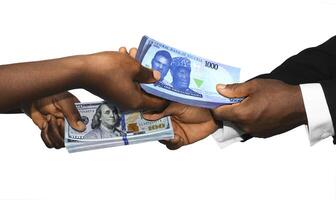 Two black african people hands holding exchanging stacks USA Dollar and Nigerian naira currrency notes on white background. pairing, Weighing and comparing two country monies. Exchange rate concept photo