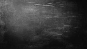 A dark, textured surface with chalky streaks creates a vintage or artistic vibe. The background evokes nostalgia and creative possibilities. photo