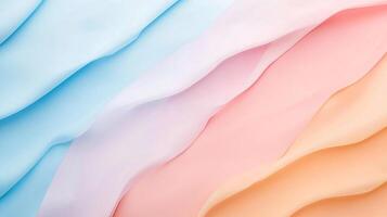 A captivating arrangement of soft flowing fabric in gentle pastel colors, presenting a harmonious blend of shades that evoke feelings of warmth and comfort. photo