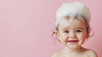 Delightful baby with a mountain of foamy bubbles on their head, beaming with a radiant smile against a pastel pink backdrop. photo