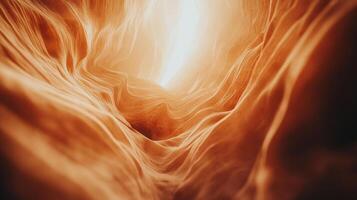Canyon walls glow with a warm, vibrant light. The natural sandstone formations create a surreal and captivating desert landscape. photo