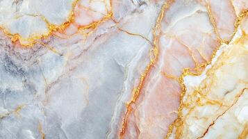 Elegant marble texture featuring a blend of white, peach, and gray tones accentuated with intricate golden vein-like patterns. photo