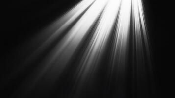 Rays of light cut through the darkness in a striking display, creating a dramatic and ethereal visual effect. Powerful illumination. photo