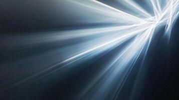Abstract light streaks in blue and white. Dynamic rays converging, creating a sense of energy and forward motion, dark background. photo