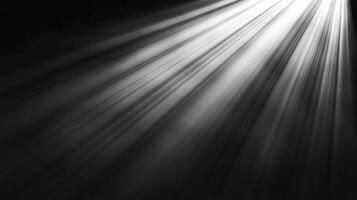 Rays of light pierce through the darkness, creating a dynamic display. The contrast creates a dramatic effect on the scene presented. photo