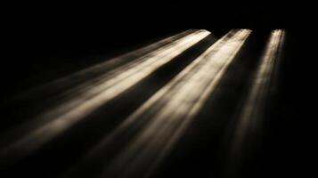 Rays of light cutting through darkness. Light streams penetrate the black, creating contrast and highlighting the abstract composition. photo