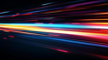 Abstract light trails streak across a dark background, evoking speed and dynamic energy with vibrant colors and fluid motion. photo
