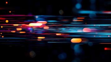 Abstract motion blur of vibrant blue, orange, and red lights on a dark background, suggesting speed and dynamic energy. photo