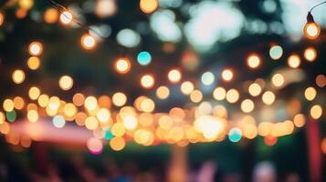 Abstract image of glowing string lights illuminating an outdoor event, creating a warm and festive atmosphere in blurred style. photo