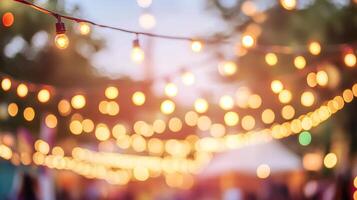 String lights illuminate the festive scene. Bokeh effect creates a warm, inviting atmosphere. Perfect for celebrations and outdoor events. photo