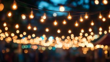 Warm glow of string lights at dusk, creating a festive and inviting atmosphere for an outdoor gathering or event after dark. photo