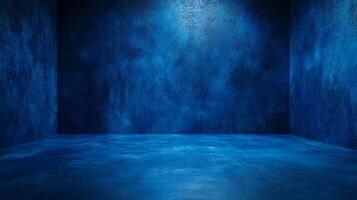 A textured blue room bathed in soft light, creating a serene, yet abstract space ideal for minimalist presentations. photo