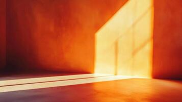A minimalist architectural shot featuring warm, ambient light streaming into an orange corner, creating dynamic shadows and visual depth. photo
