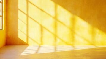 Sunlight creates abstract patterns on a yellow wall, illuminating the stark architectural space and casting shadows across the floor. photo
