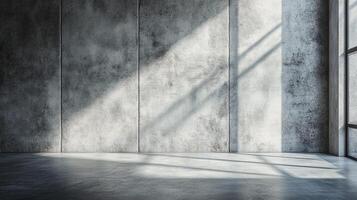Sunlight streams across a gray textured wall in an empty room, creating stark shadows and highlights. Clean, minimal, and modern. photo