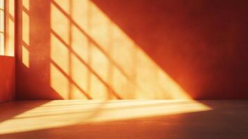 Sunlight streams through a window casting geometric shadows on a warm terracotta-colored wall and floor, creating a serene and artistic space. photo
