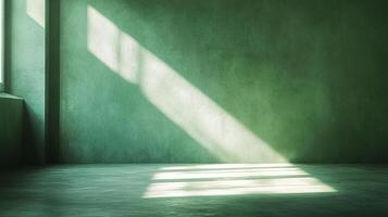 Sunlight streaks across a textured green wall and floor, casting shadows and highlighting the subtle variations in tone and surface. photo