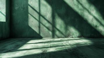 Interior space with light and shadow patterns cast on a textured green wall. A minimalistic and geometric composition. photo