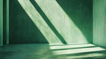 Green room illuminated by diagonal shafts of sunlight creating a dramatic effect of light and shadow. Abstract interior background. photo