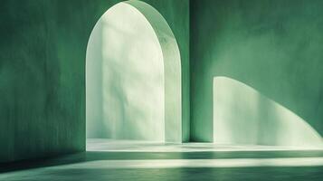 An empty, light-filled green room with arched doorway. Sunlight creates a calming and peaceful ambiance in the minimalist architecture. photo