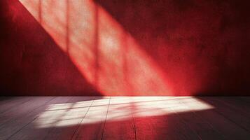 A dramatic interplay of light and shadow cascades across a textured red wall and wooden floor, creating a striking visual contrast. photo