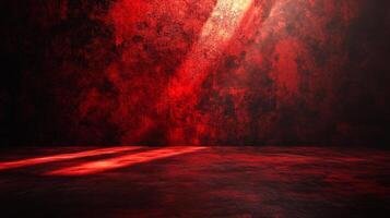 A dramatic backdrop featuring intense shades of red and black, creating a spotlight effect on a textured surface. Moody and bold. photo