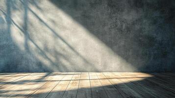 Sunlight streams across a textured wall and wooden floor, casting shadows and creating a serene, empty interior scene. Minimalist backdrop. photo