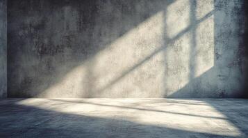 Light streams through a gridded window, casting shadows on a textured concrete wall in an empty room with a weathered floor. photo