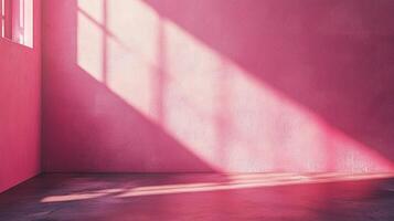 Pink room with dramatic light and shadows from a window creating interesting patterns on the wall and floor, modern interior design element. photo