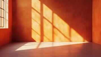 Sunlight streams through a window, casting shadows on the burnt orange wall, highlighting the room's textured surface and minimalist design. photo