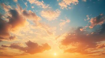 Sky illuminated by warm sunlight, wispy clouds drift across a canvas of vibrant orange and blue hues at dusk or dawn, creating a serene scene. photo