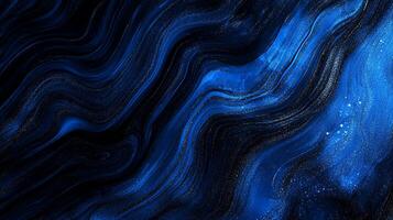 Abstract, swirling patterns of indigo and black create a dynamic, almost ethereal, effect. Subtle textures add depth and visual interest. photo