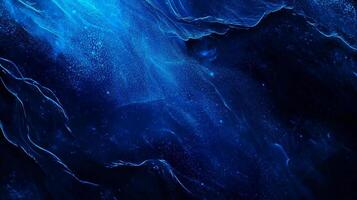 Abstract deep blue image showcasing a swirling cosmic dust cloud with subtle light variations. Evokes a sense of mystery and depth. photo