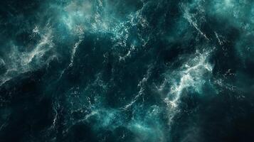 A mesmerizing overhead shot captures the frothy, dynamic essence of ocean waves, creating a serene yet powerful visual experience. photo