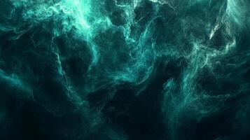 Abstract aqua and teal clouds create a dreamy, ethereal atmosphere with swirling textures and dynamic shapes against a dark background. photo