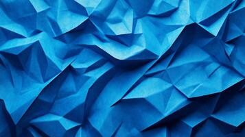 Close up of crumpled blue textured paper creating an abstract background photo