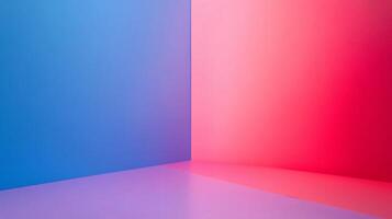 Vibrant, colorful corner of empty room with blue and pink walls, creating gradient effect on the floor photo