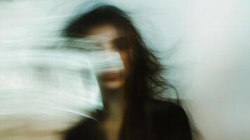 Abstract portrait of a woman with flowing hair and an enigmatic expression, rendered with artistic blur and movement. photo