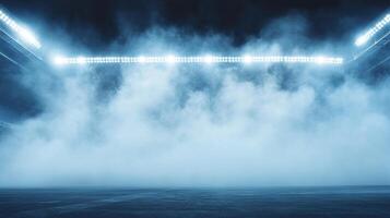 An atmospheric stadium view showcases a dense fog illuminated by bright lights, creating an ethereal and dramatic scene. photo