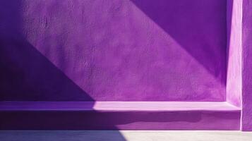 A vibrant violet wall with a stark diagonal shadow creates a compelling abstract scene. The simple backdrop is architecturally interesting. photo