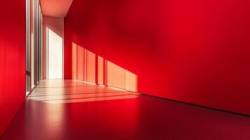 A vivid red hallway bathed in sunlight, creating sharp shadows and a minimalist aesthetic. Bright and bold design for a modern space. photo