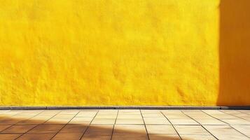 Bright yellow wall with a tiled floor in sunlight, creating a vibrant, abstract architectural background. Minimalist and eye-catching. photo